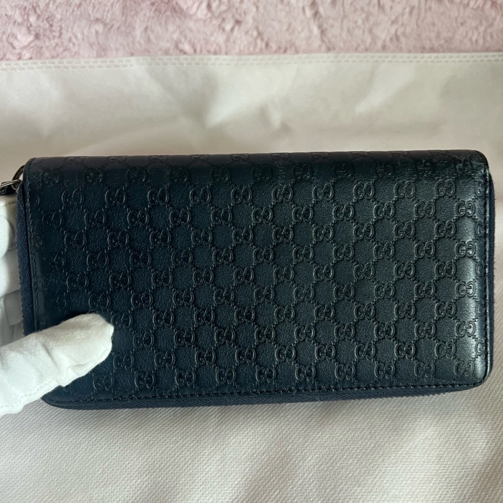 Gucci Blue Embossed Zippy Wallet